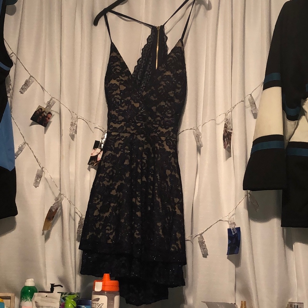 prom/homecoming dress. navy blue, v-line neck, back is half laced and open.